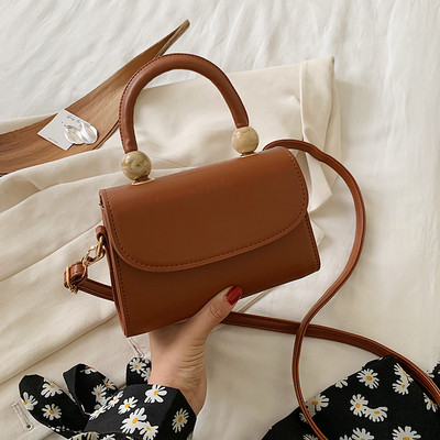 Moderna ženska torba sa kratkom i dugom ručkom od eko kože