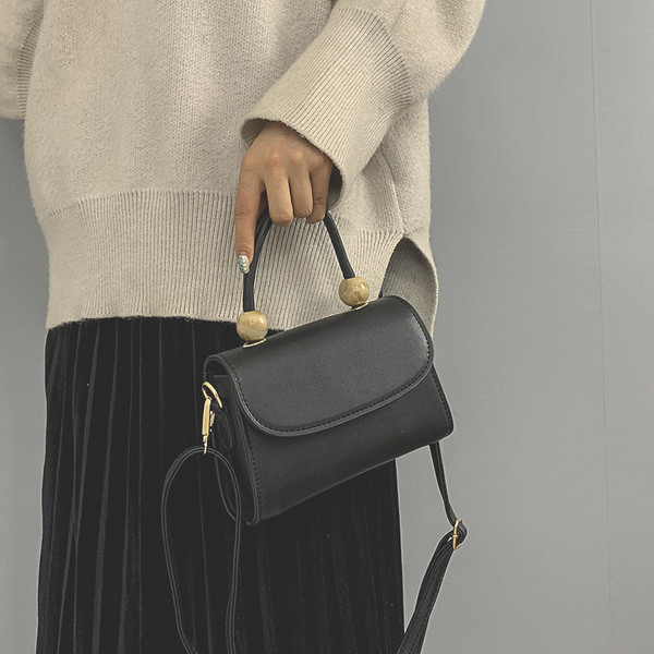 Moderna ženska torba sa kratkom i dugom ručkom od eko kože