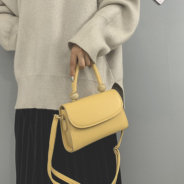 Moderna ženska torba sa kratkom i dugom ručkom od eko kože