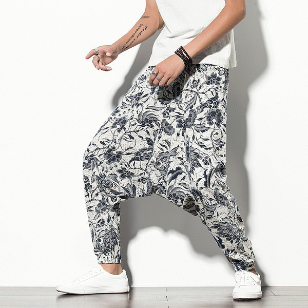 Široke muške hlače s džepovima i uzorkom