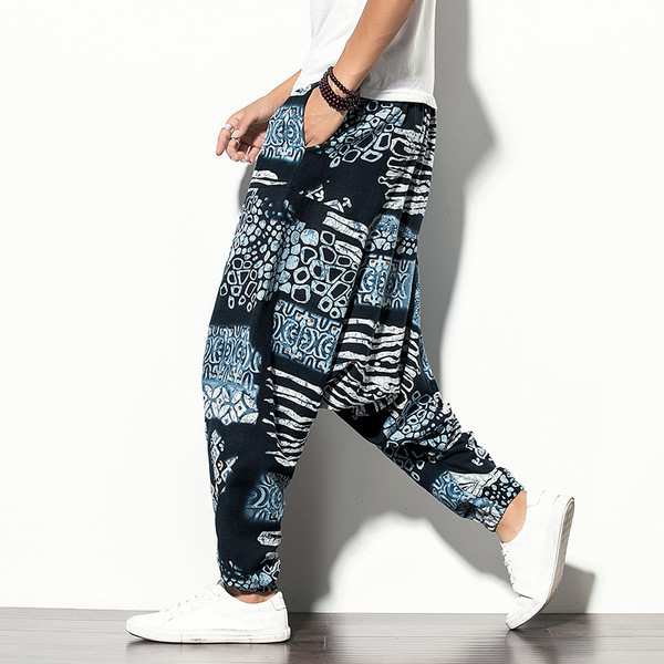 Široke muške hlače s džepovima i uzorkom