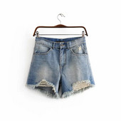 Uus mudel rebenenud motiividega teksapüksid