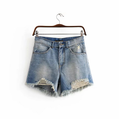 Uus mudel rebenenud motiividega teksapüksid