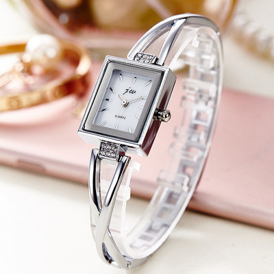 Retro sieviešu metāla pulkstenis ar akmeņiem