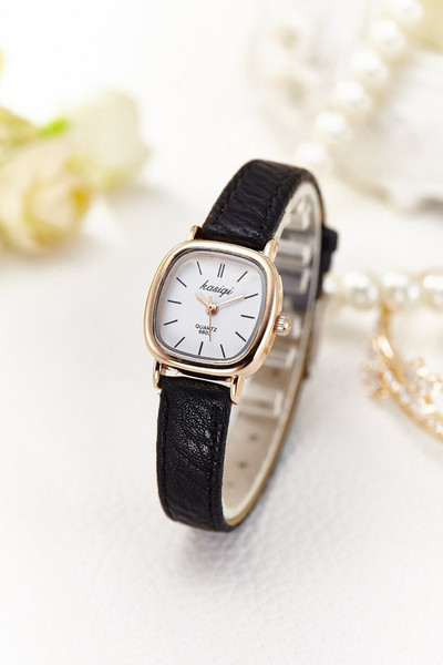 Nahast rihmaga retrokvartsist naiste käekell