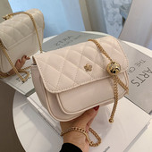 Moderns sieviešu komplekts no eko ādas ar garu metāla ķēdīti