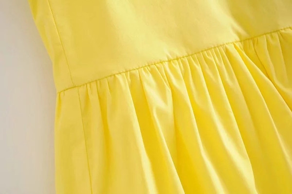 Modernas sieviešu bikses ar augstu vidukli dzeltenā krāsā