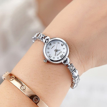 Kvarca sieviešu metāla rokassprādzes pulkstenis