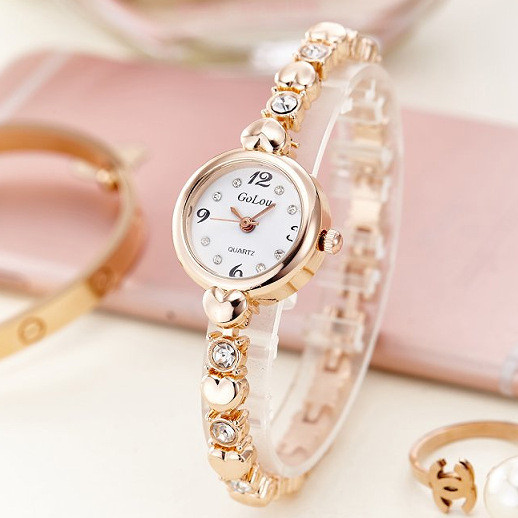 Kvarca sieviešu metāla rokassprādzes pulkstenis