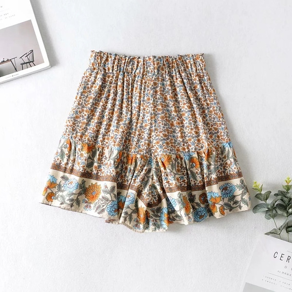 Lillemotiividega vabaaja naiste lühikesed püksid