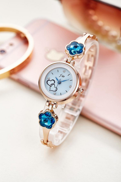 Fém női karóra köves típusú karkötővel