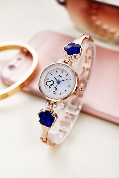 Fém női karóra köves típusú karkötővel