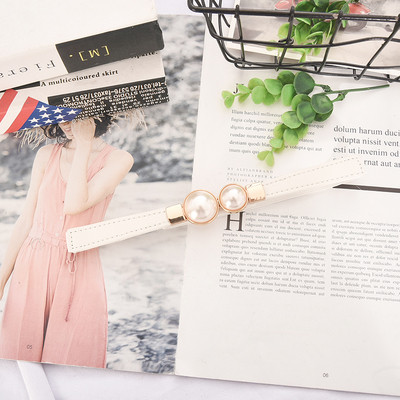 Moderna sieviešu plānā eko-ādas josta ar pērlēm