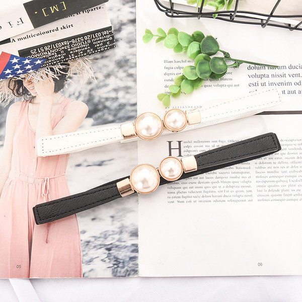 Moderna sieviešu plānā eko-ādas josta ar pērlēm