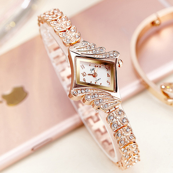 Moderna sieviešu pulksteņa tipa rokassprādze ar akmeņiem