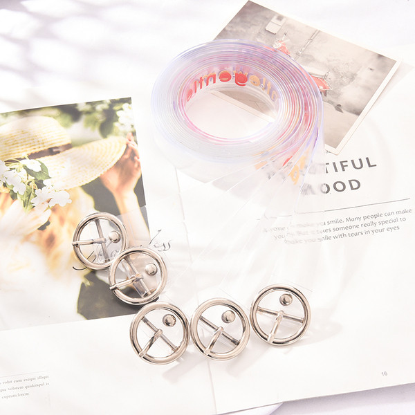 Női szilikon öv felirattal és fém elemmel