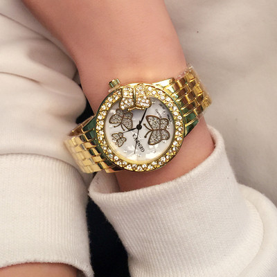 Fém női karóra pillangókkal