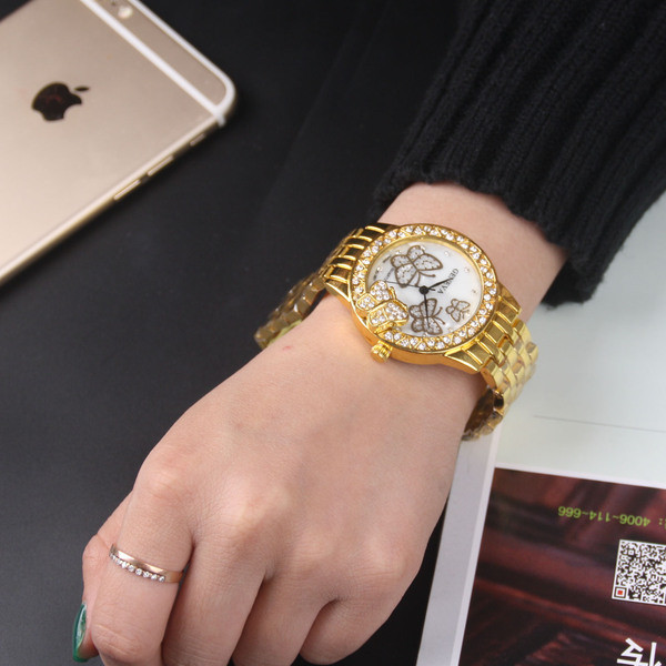 Fém női karóra pillangókkal