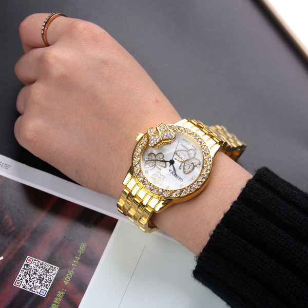 Fém női karóra pillangókkal