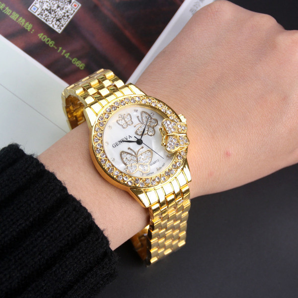 Fém női karóra pillangókkal