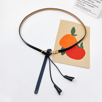 Sieviešu slaida josta ar mākslīgās ādas pušķi