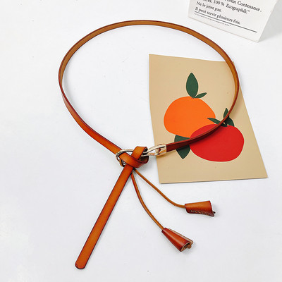 Sieviešu slaida josta ar mākslīgās ādas pušķi