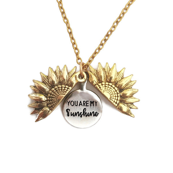 Moderna sieviešu kaklarota ar saulespuķu kulonu