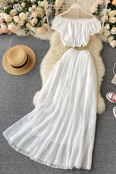 Moderan ženski komplet duge suknje i kratke bluze