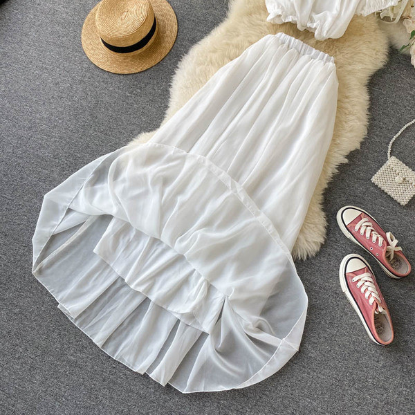 Moderan ženski komplet duge suknje i kratke bluze