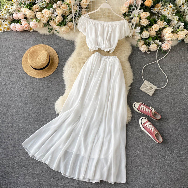 Moderan ženski komplet duge suknje i kratke bluze