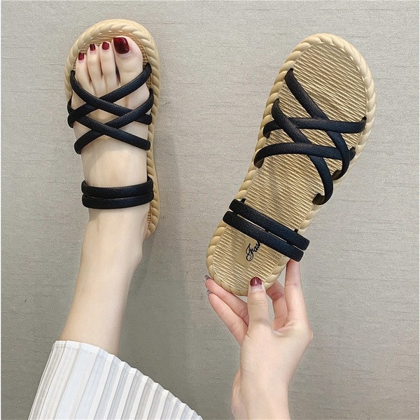 Mitmes värvitoonis ökonahast lameda tallaga naiste sandaalid