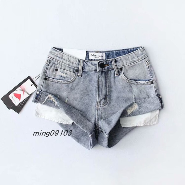 Ženske traper kratke hlače sa poderanim motivima