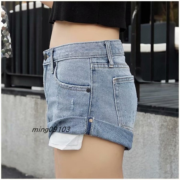 Ženske traper kratke hlače sa poderanim motivima