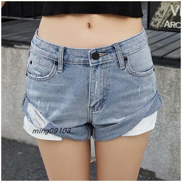 Ženske traper kratke hlače sa poderanim motivima