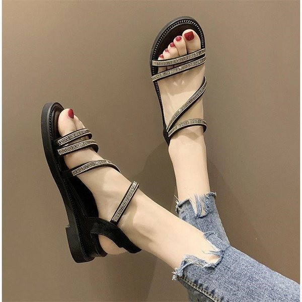 Ženske sandale sa kamenčićima i ravnim đonom u crnoj boji