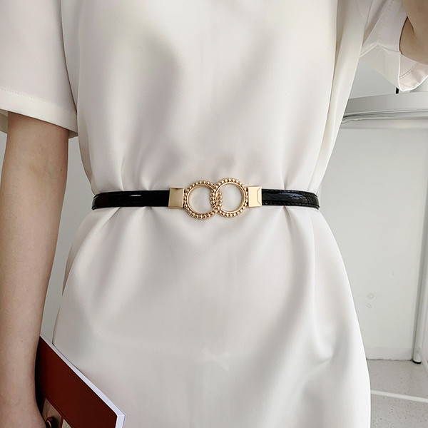 Ženski kožni remen sa metalnim alkama