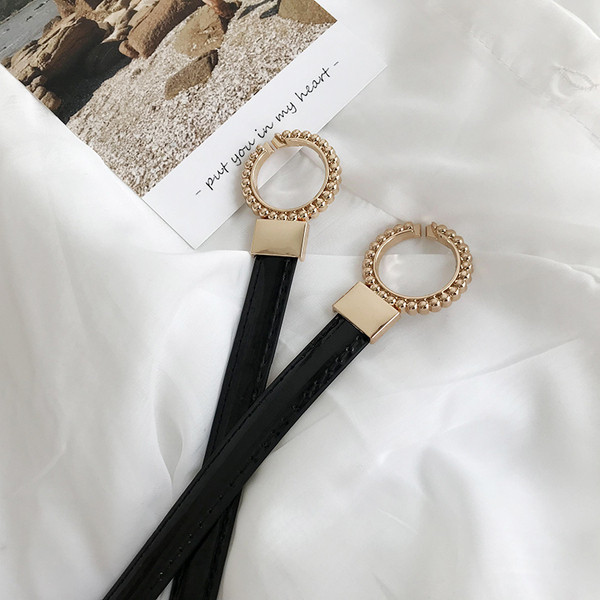 Ženski kožni remen sa metalnim alkama