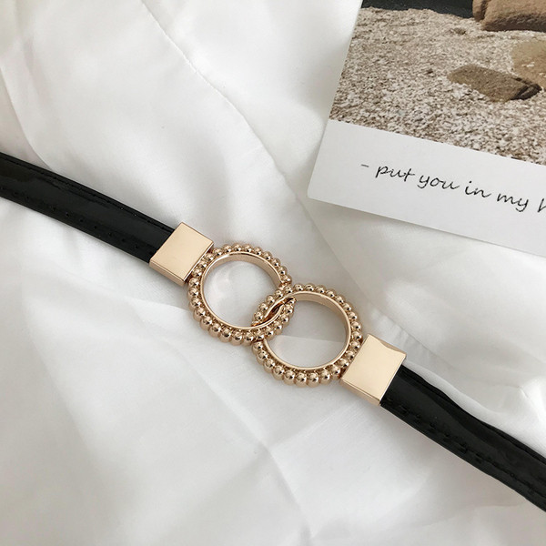 Ženski kožni remen sa metalnim alkama