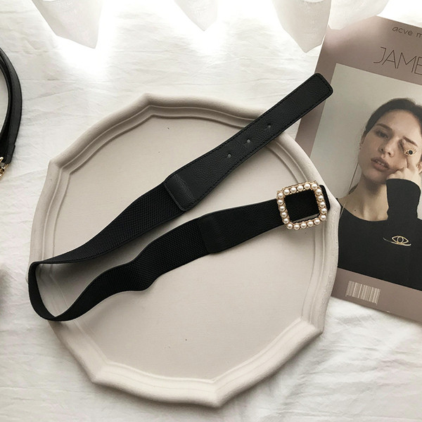 Női rugalmas öv fém csattal és gyöngyökkel