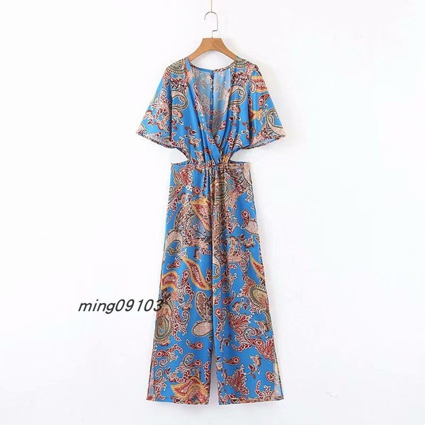 Moodne naiste kombinesoon spits-kaelusega ja väljalõigetega