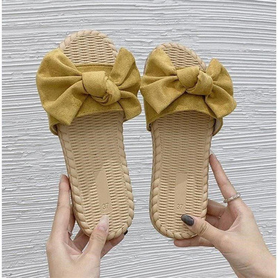 Hétköznapi női papucs szalaggal, lapos talppal, három színben