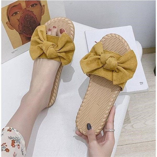 Hétköznapi női papucs szalaggal, lapos talppal, három színben