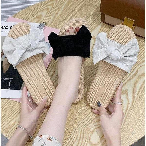 Hétköznapi női papucs szalaggal, lapos talppal, három színben