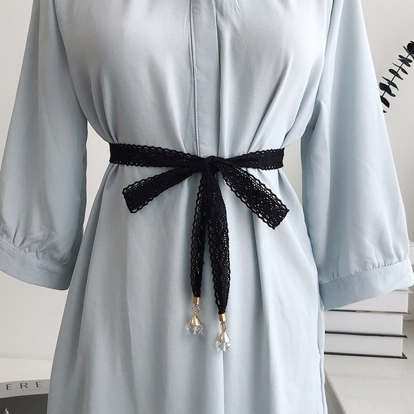 Kötött női öv gyöngyökkel