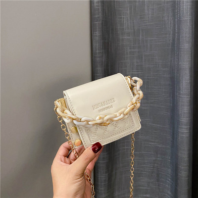 Hétköznapi női kistáska hosszú füllel több színben