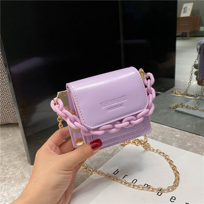 Hétköznapi női kistáska hosszú füllel több színben