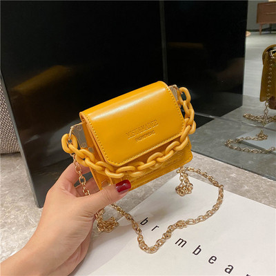 Hétköznapi női kistáska hosszú füllel több színben