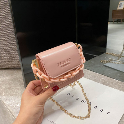 Hétköznapi női kistáska hosszú füllel több színben