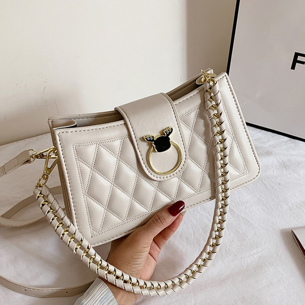 Modern női táska eko bőrből, fém rögzítéssel