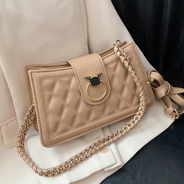 Modern női táska eko bőrből, fém rögzítéssel